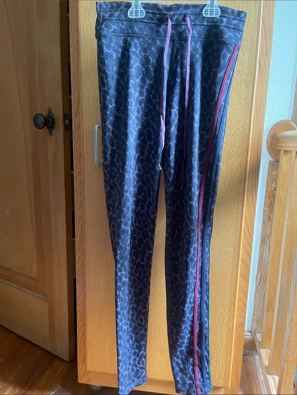 The Upside Gray Leopard-Print Leggings with Mauve and the other black